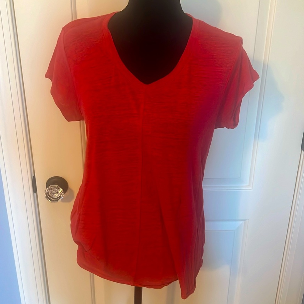 Linen short sleeve shirt. Centerline seam on front and back for slimming look